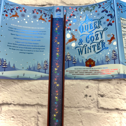 A Queer & Cozy Winter Anthology by Rainbow Crate