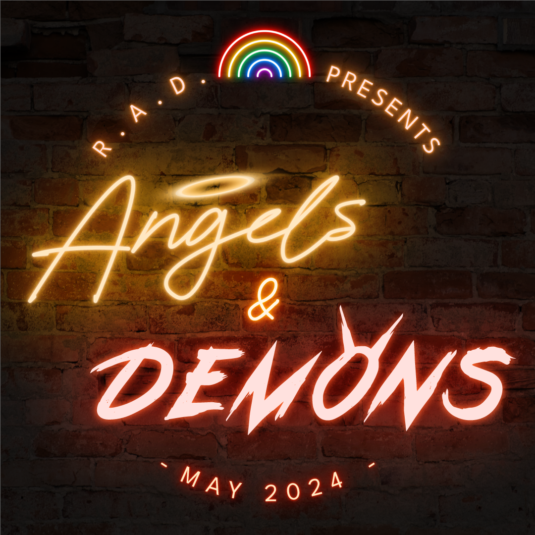 a neon sign on a dark brick wall. The sign says “Angels & Demons,” and angel is in yellow with a halo over the g. Demons is in red with horns on the o. Above this it says “R.A.D. presents,” and below “May 2024”