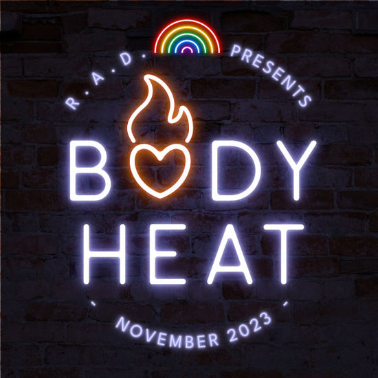 a dark blue brick wall with a neon sign on it. There’s a rainbow at the top. The outer words say “RAD presents: November 2023” in a circle. In the center it says “Body Heat” in blue neon with a red neon heart replacing the O, and neon flames shooting out of it. Slides 2 and 3 show the book covers and a short summary of the stories.