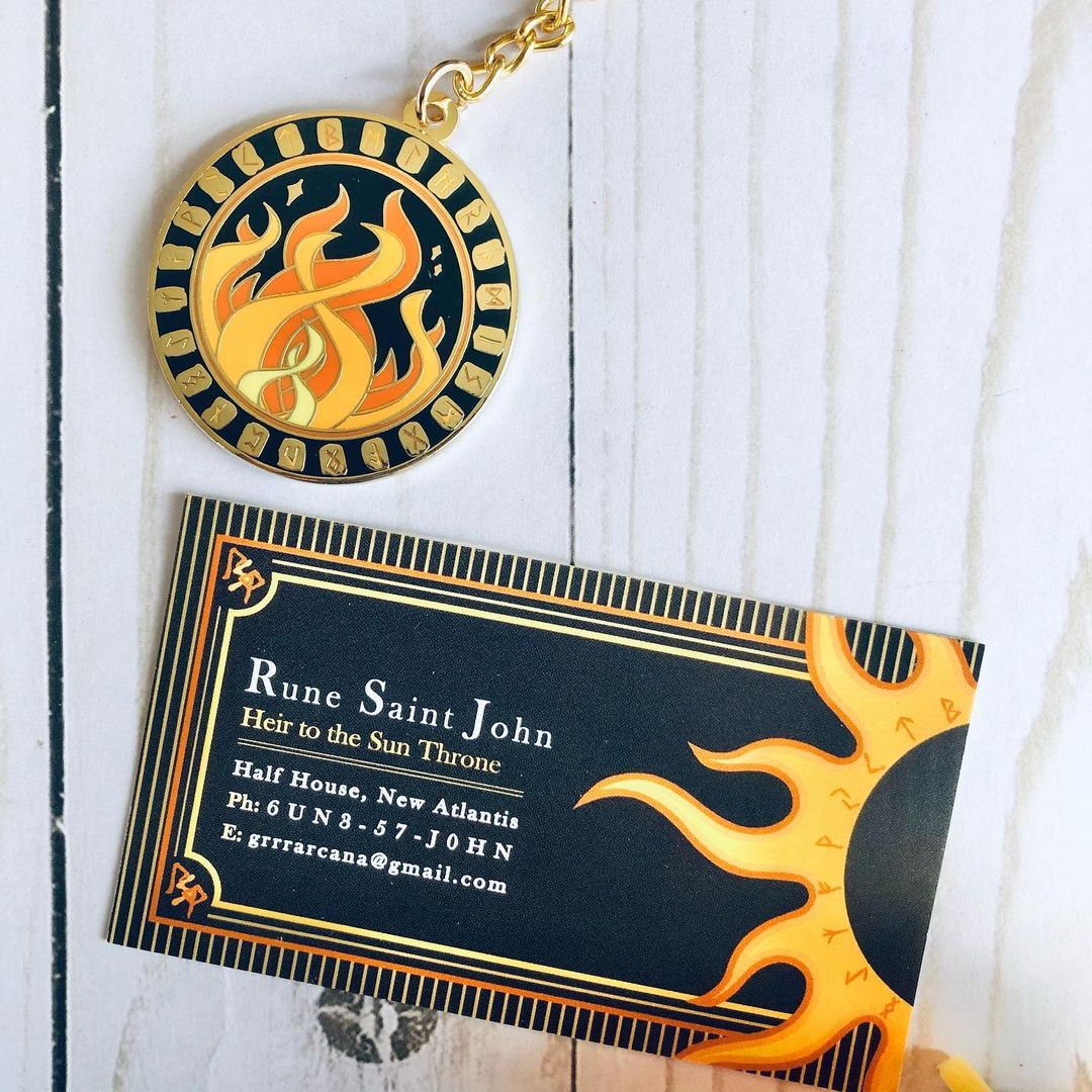 Our keychain and business card as described above.